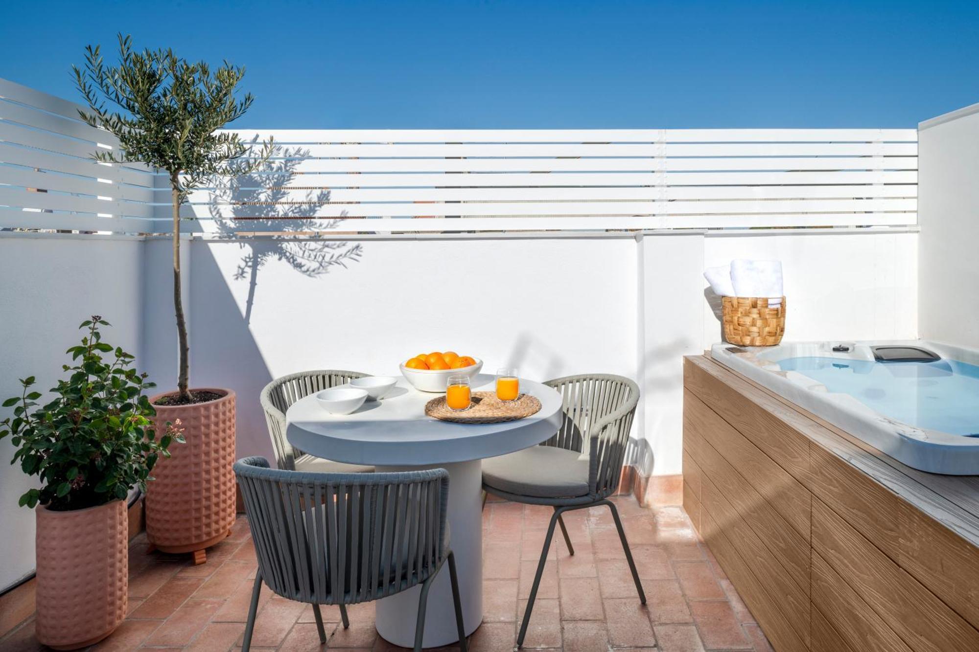 Magno Apartments Santa Clara - Private Terraces With Jacuzzi 塞维利亚 外观 照片